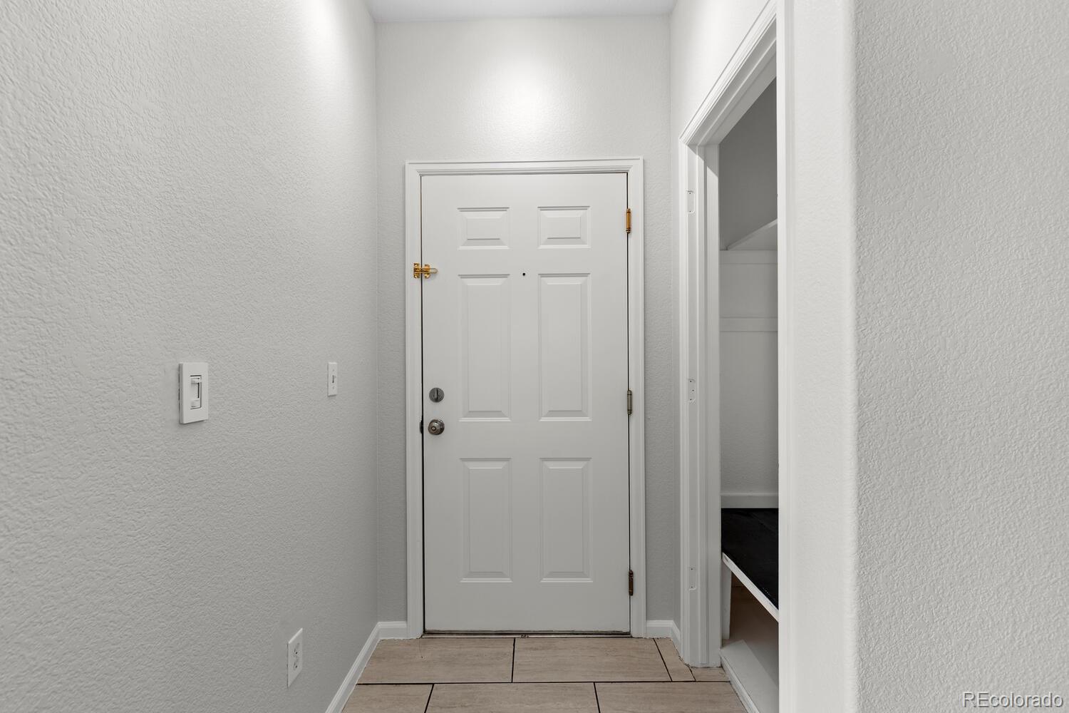 14251 East 1st Drive, Unit 305 Aurora, CO 80011 - Photo 20 of 22 a view of a hallway