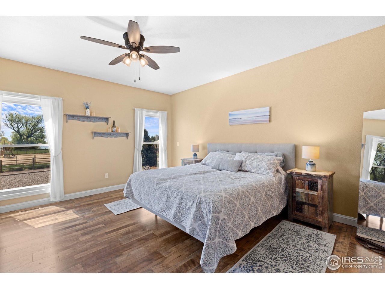 111 Hunter's Cove Road Mead, CO 80542 - Photo 12 of 40 Main floor primary bedroom