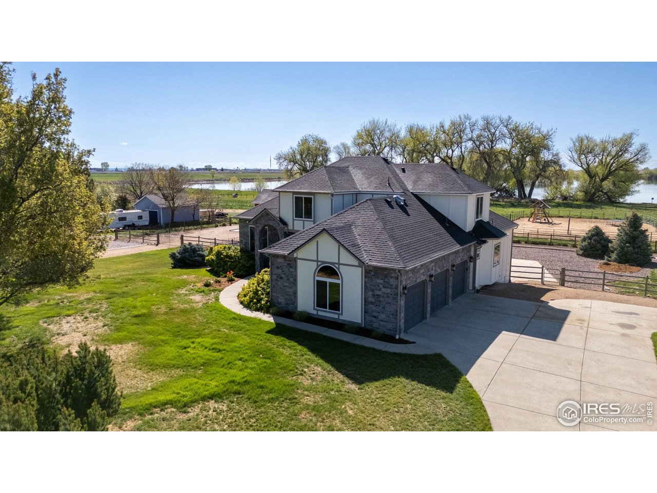 111 Hunter's Cove Road Mead, CO 80542 - Photo 28 of 40 Beautiful home on 2.26 acres with lake behind