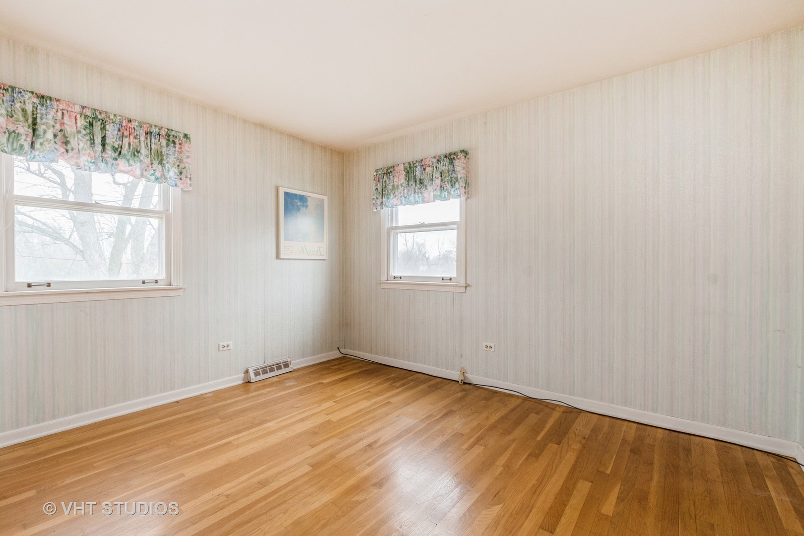 2849 Willow Road Homewood, IL 60430 - Photo 12 of 15 an empty room with wooden floor and windows
