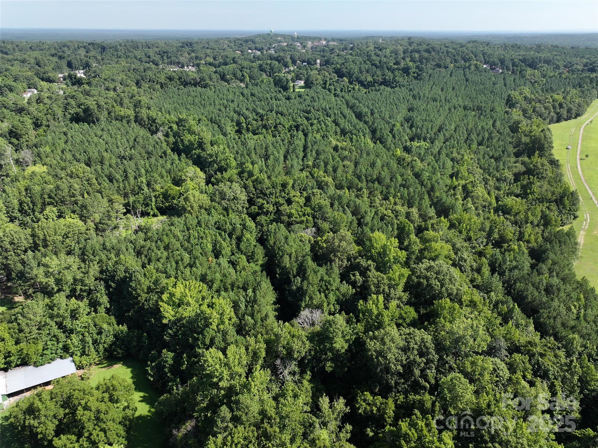 0 Chesterfield Road Wadesboro, NC 28170 - Photo 6 of 8 an aerial view of a house with a yard