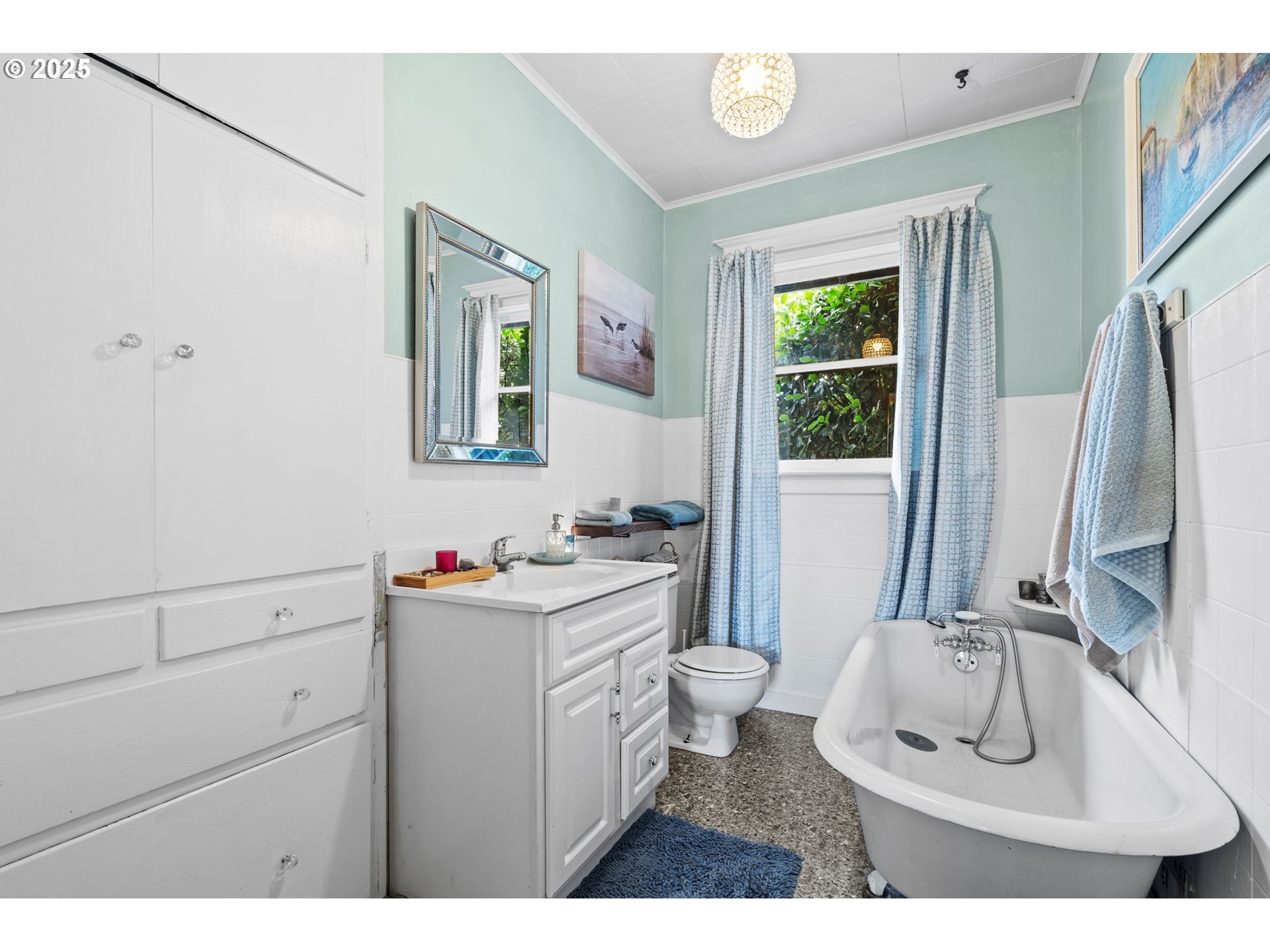 1306 B Street Washougal, WA 98671 - Photo 19 of 32 a bathroom with a sink toilet and mirror