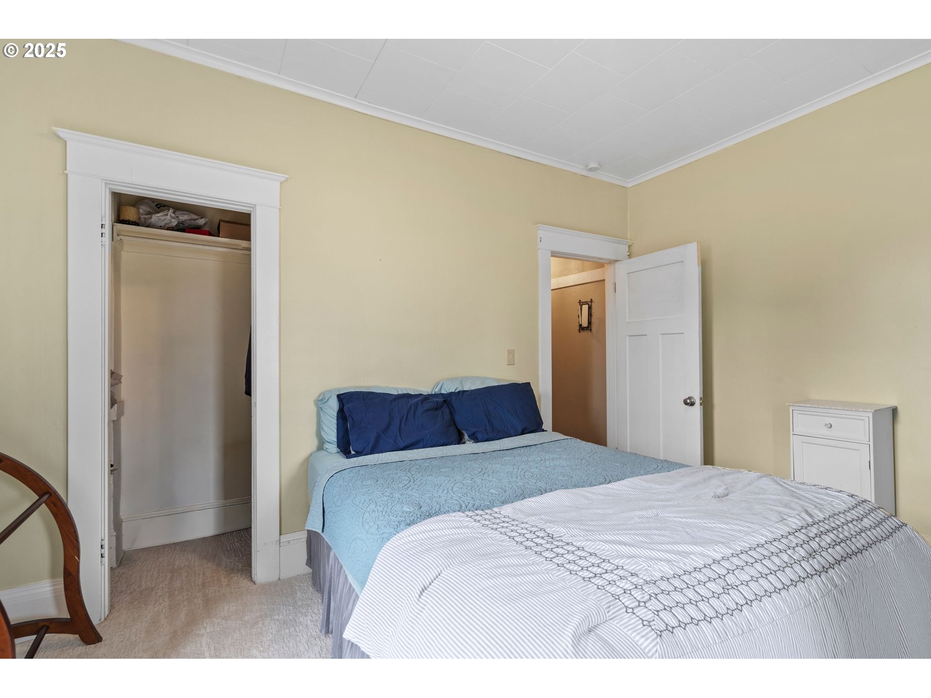 1306 B Street Washougal, WA 98671 - Photo 21 of 32 a bedroom with a bed and a cabinets