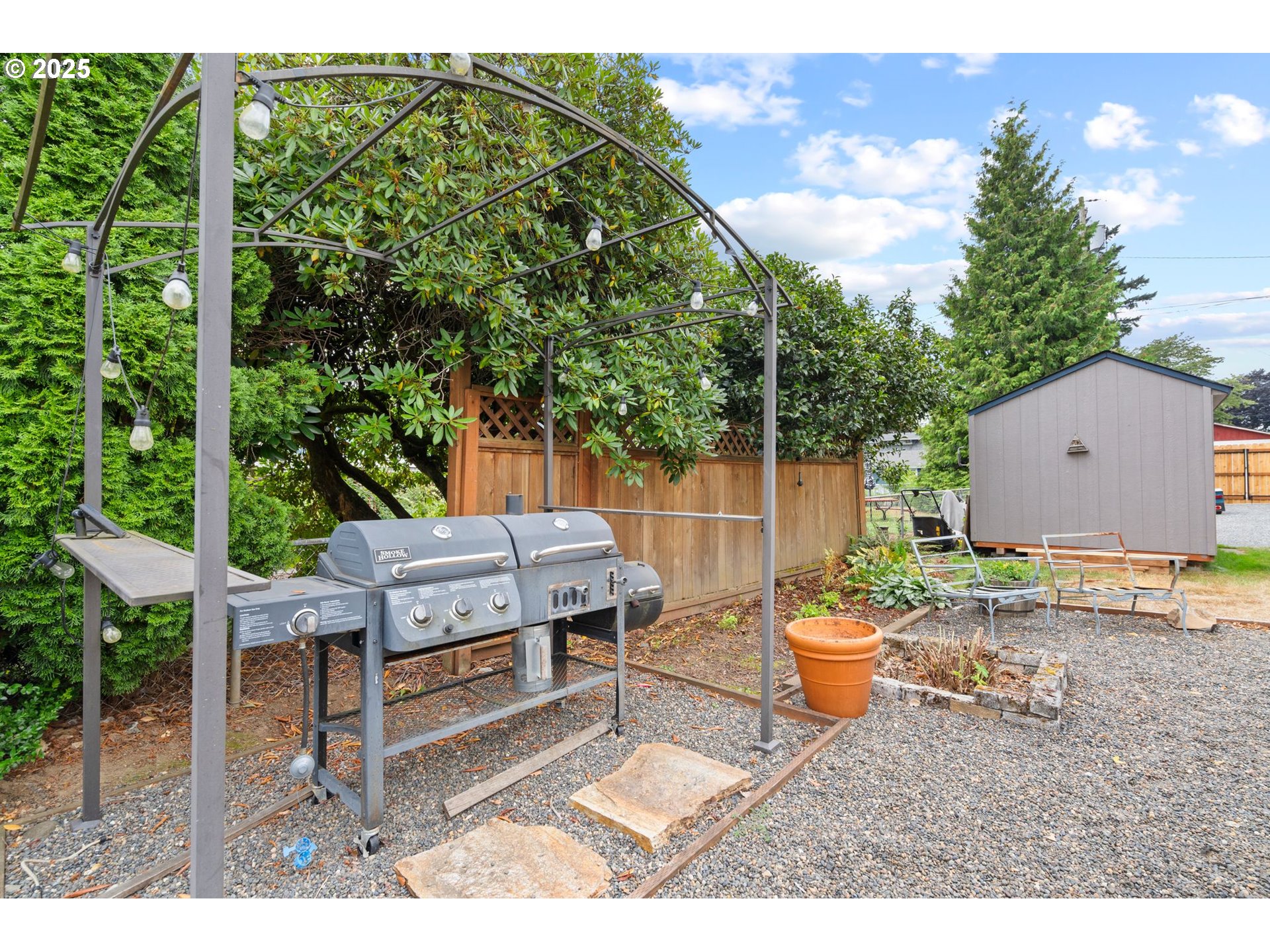 1306 B Street Washougal, WA 98671 - Photo 25 of 32 a backyard of a house with outdoor seating