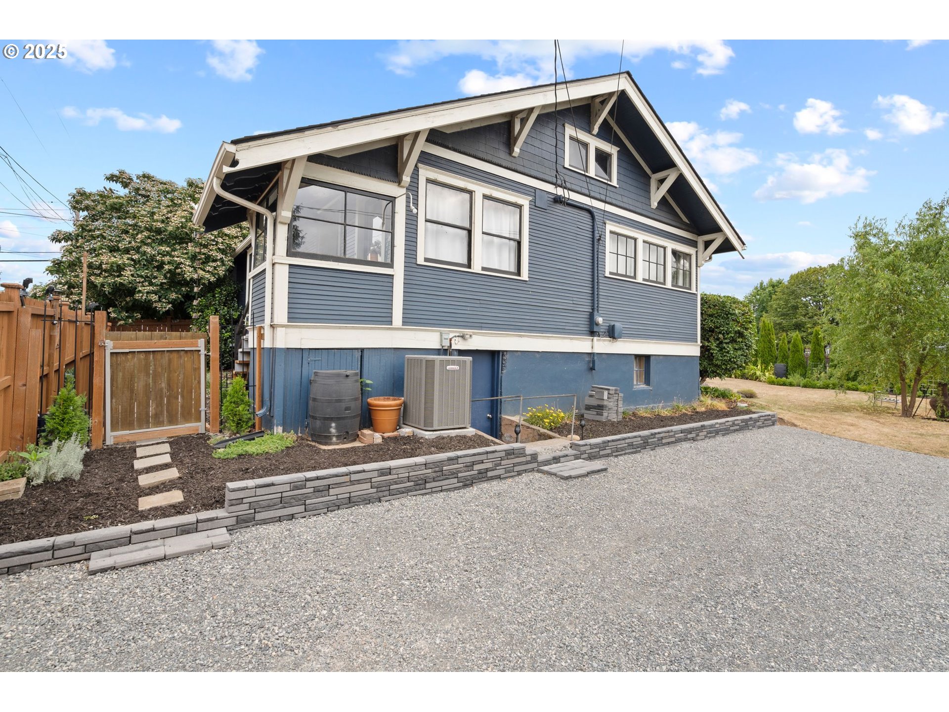 1306 B Street Washougal, WA 98671 - Photo 29 of 32 a view of a house with a yard and large tree