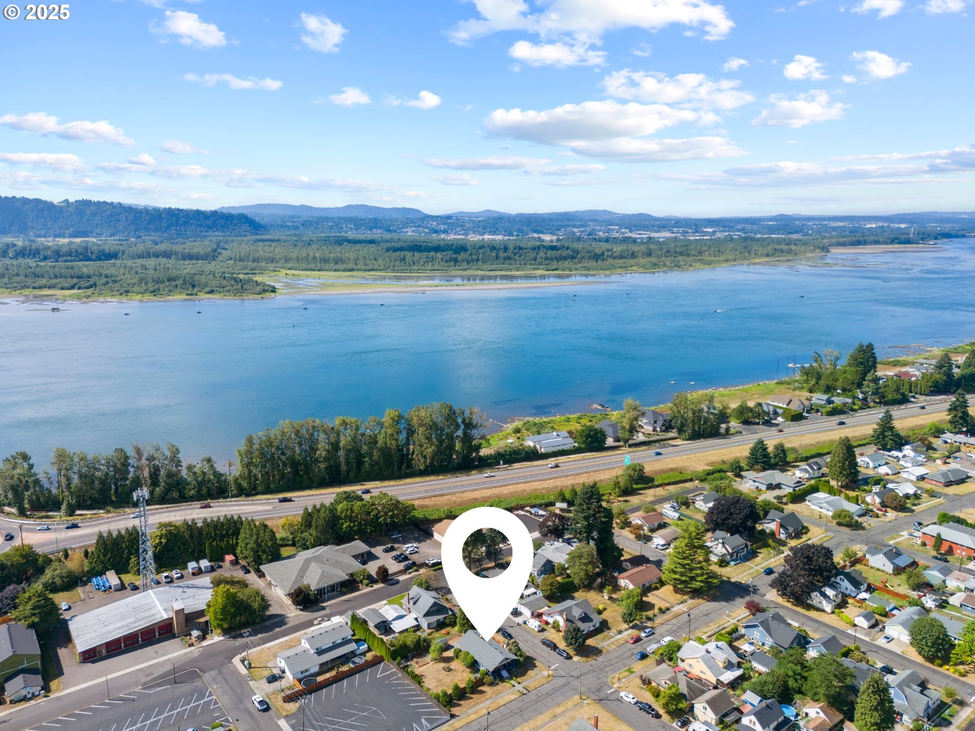 1306 B Street Washougal, WA 98671 - Photo 5 of 32 a view of a lake with a mountain