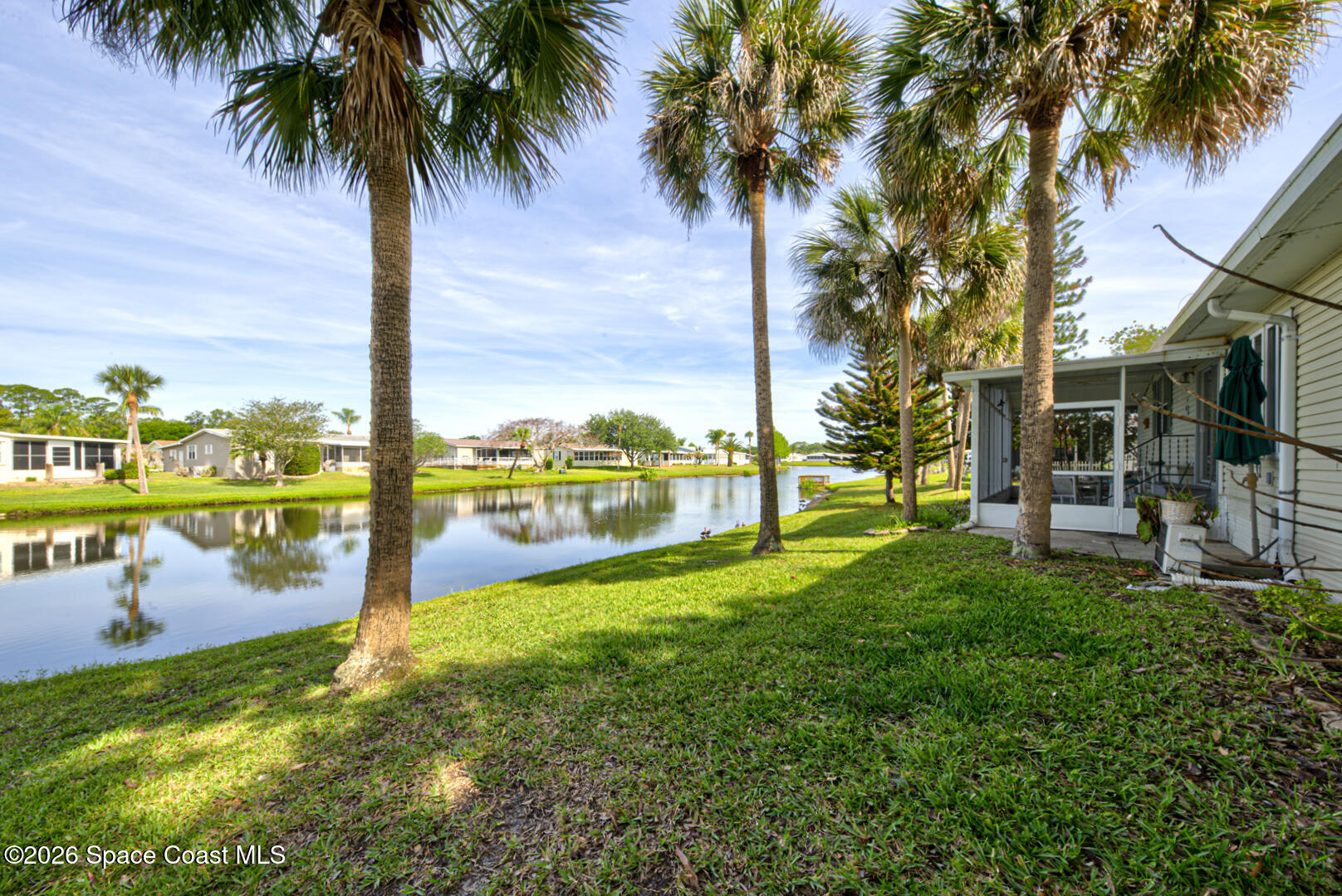 176 Woodsmill Boulevard, Unit 177 Cocoa, FL 32926 - Photo 51 of 63 49 backyard on water