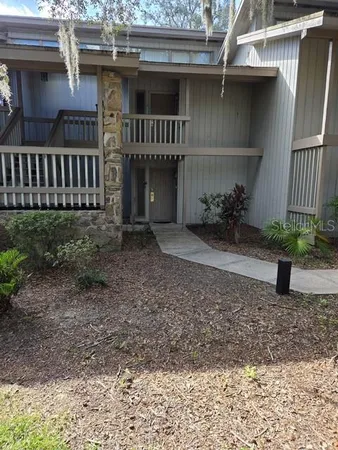a view of a house with a porch