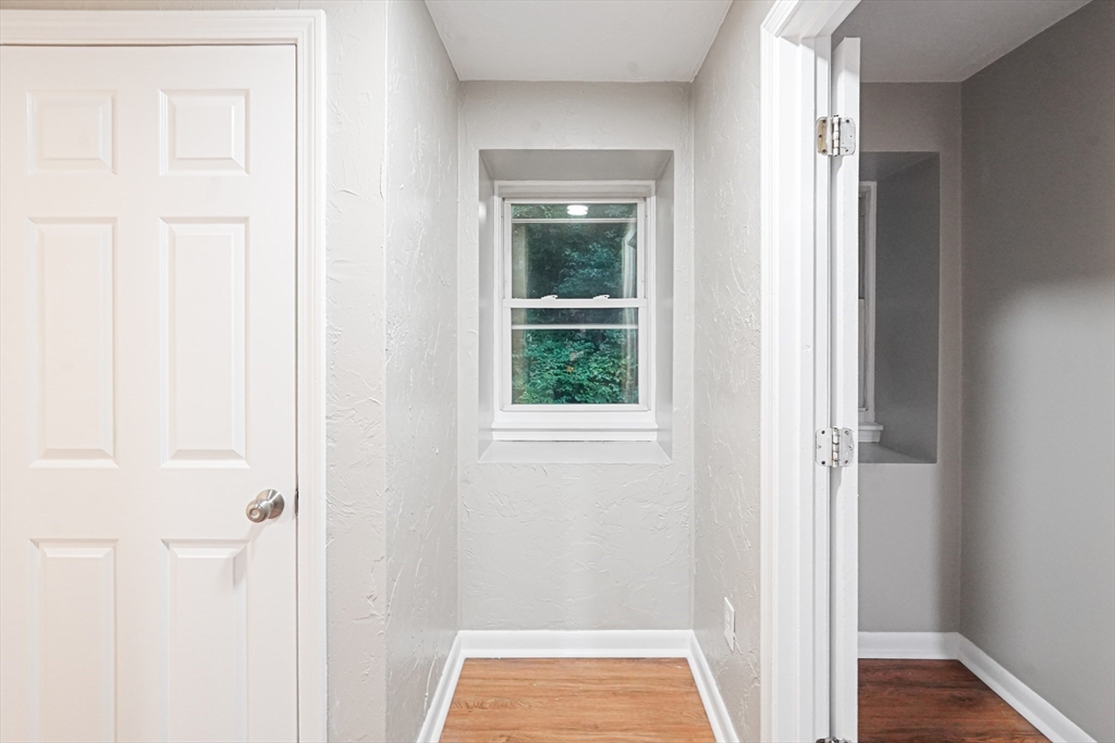 5-9 Debra Lane Bellingham, MA 02019 - Photo 17 of 25 a view of front door with hallway