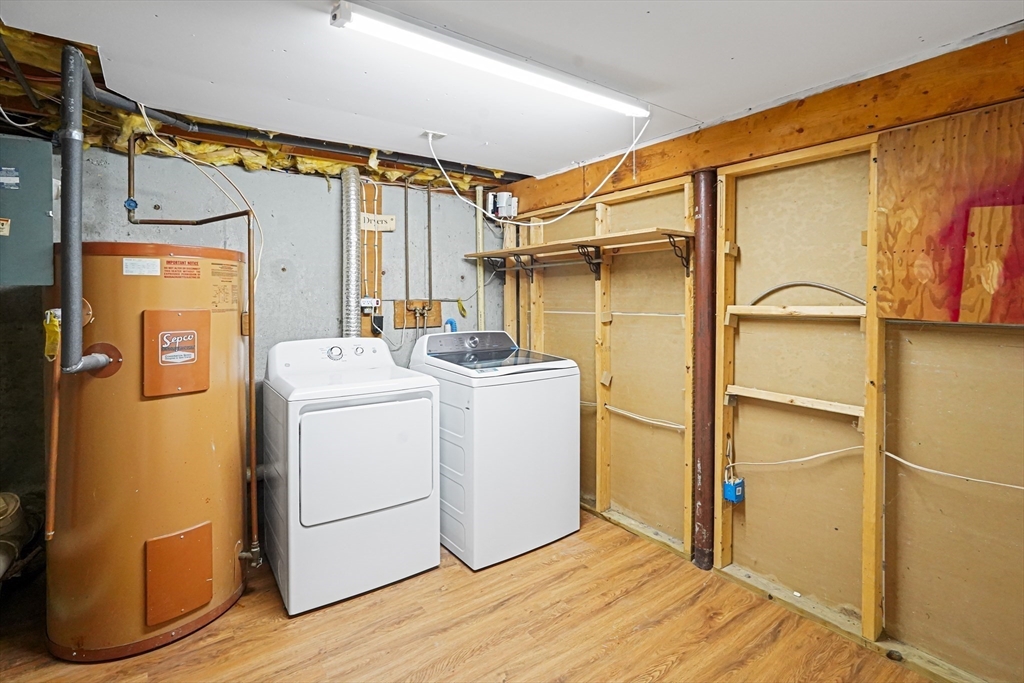 5-9 Debra Lane Bellingham, MA 02019 - Photo 25 of 25 a utility room with dryer and washer