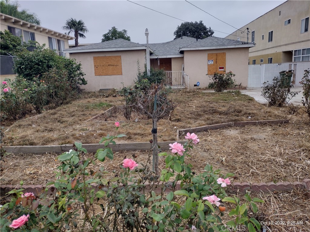 2210 East El Segundo Boulevard Compton, CA 90222 - Photo 1 of 1 a front view of a house with yard