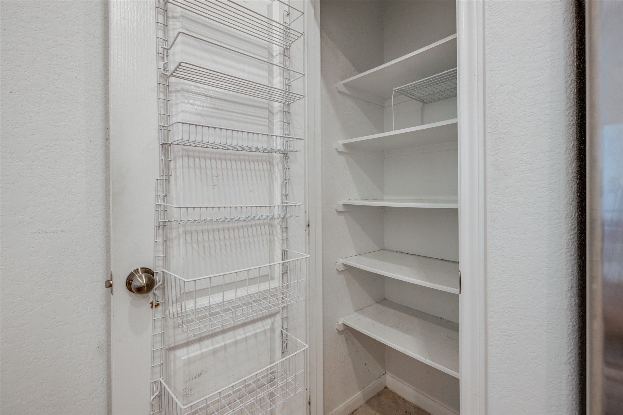 7123 Panther Ridge Drive Spring, TX 77389 - Photo 16 of 31 a view of a room with rack on the wall