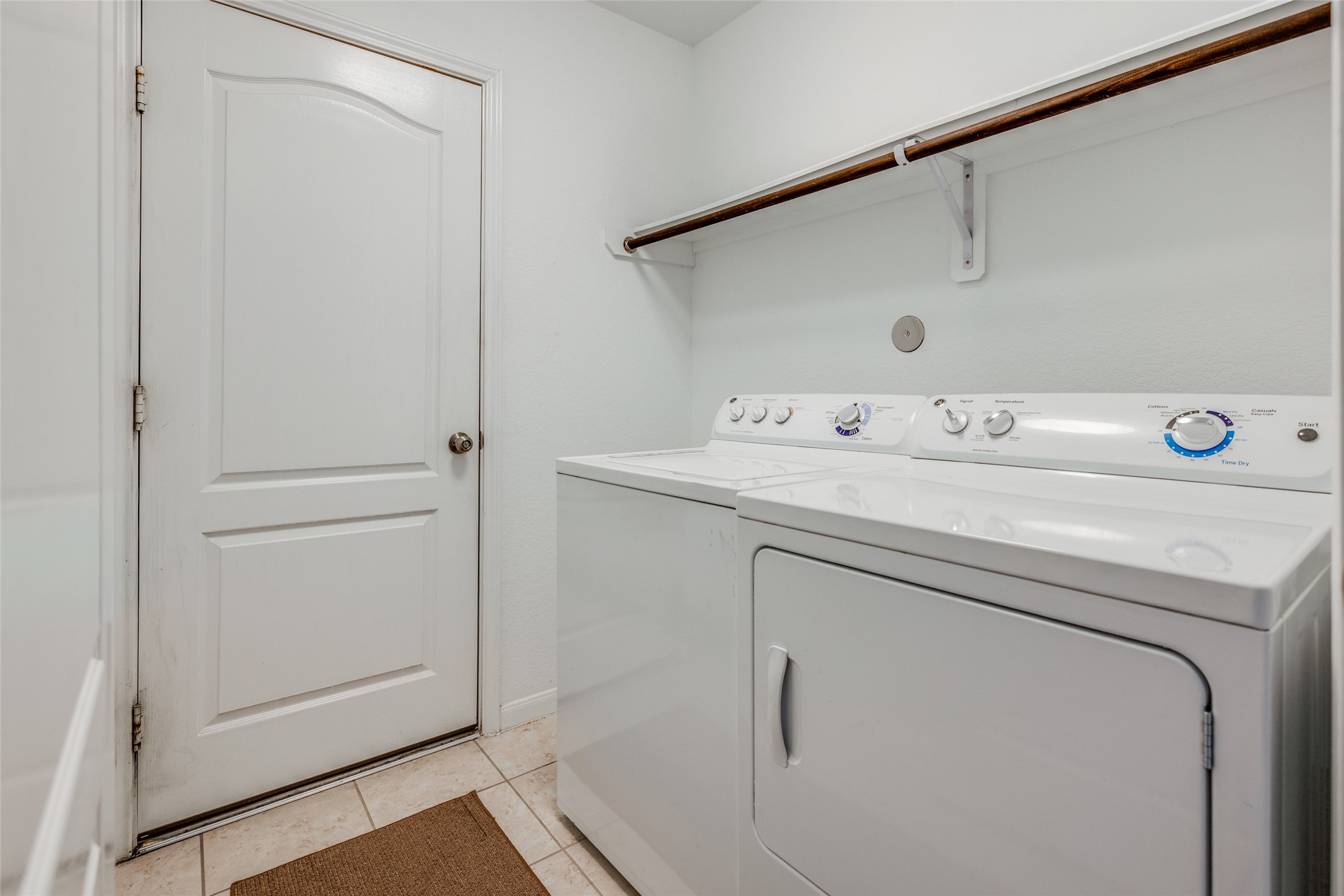 7123 Panther Ridge Drive Spring, TX 77389 - Photo 21 of 31 a utility room with dryer and washer
