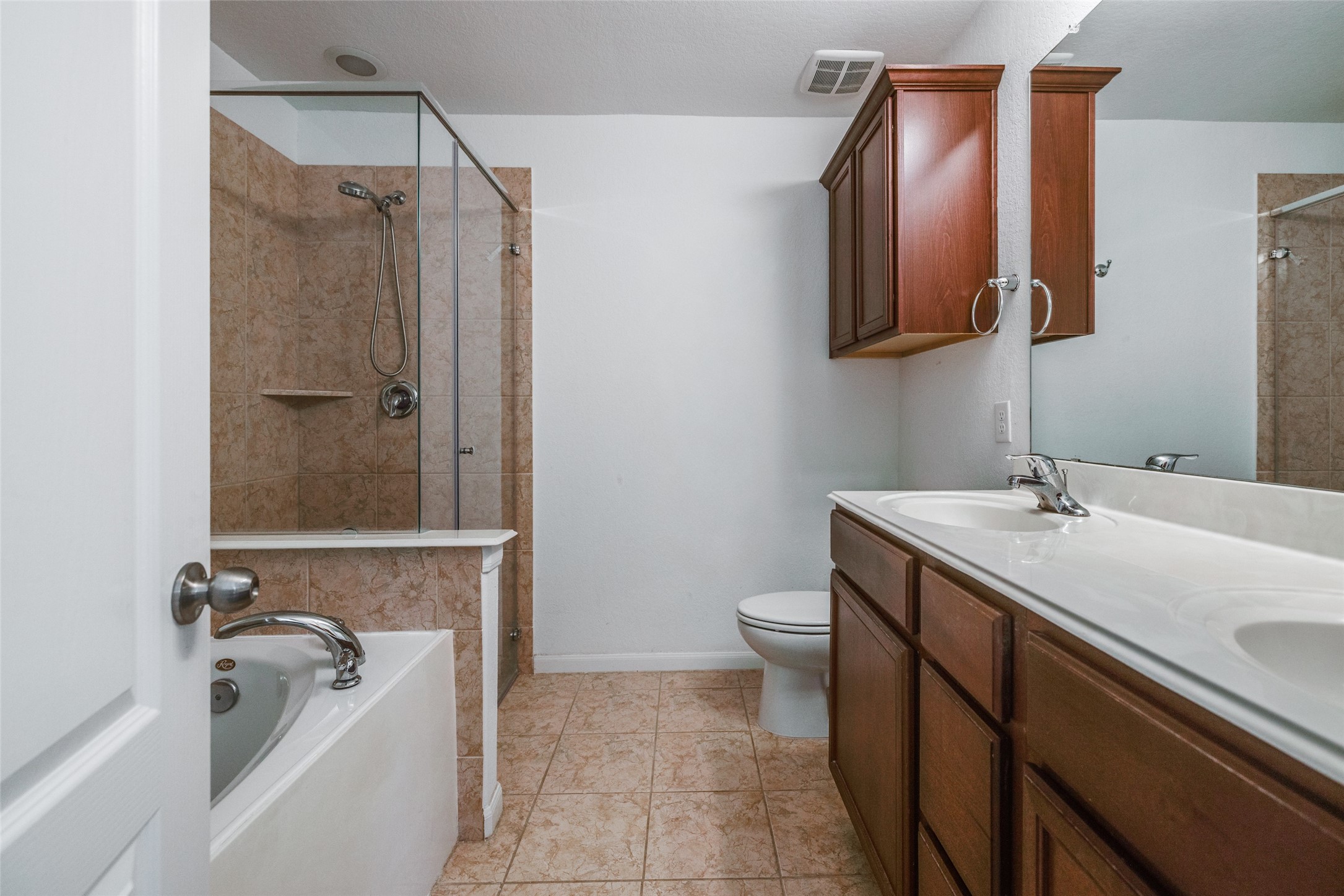 7123 Panther Ridge Drive Spring, TX 77389 - Photo 26 of 31 a bathroom with a sink a toilet and shower