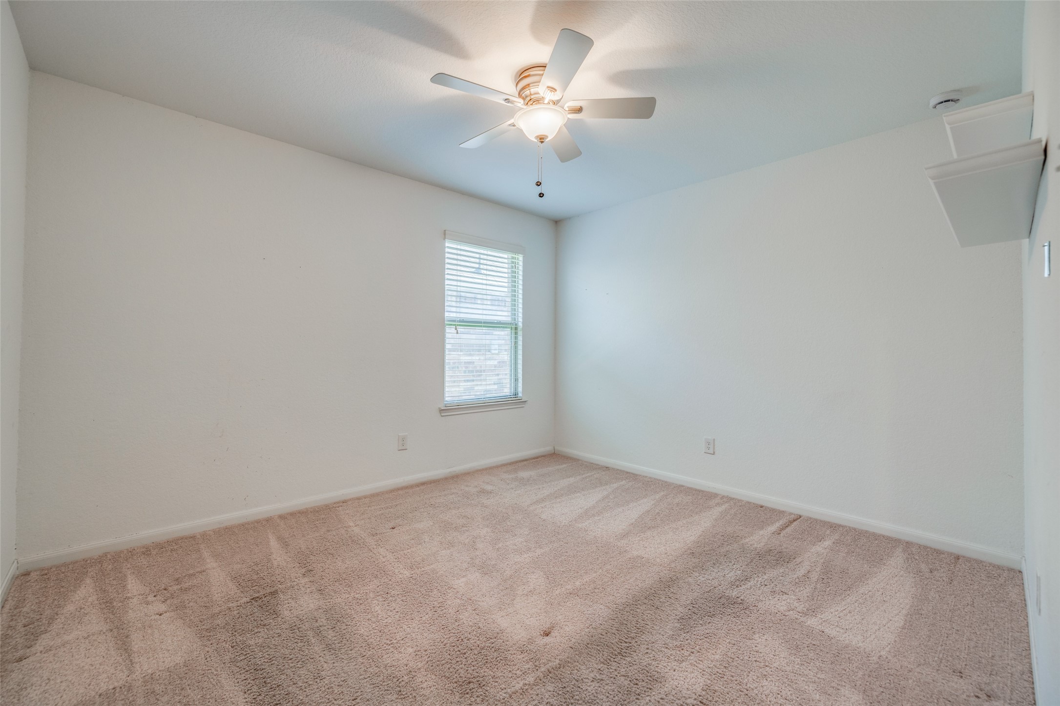7123 Panther Ridge Drive Spring, TX 77389 - Photo 28 of 31 a view of an empty room with a window