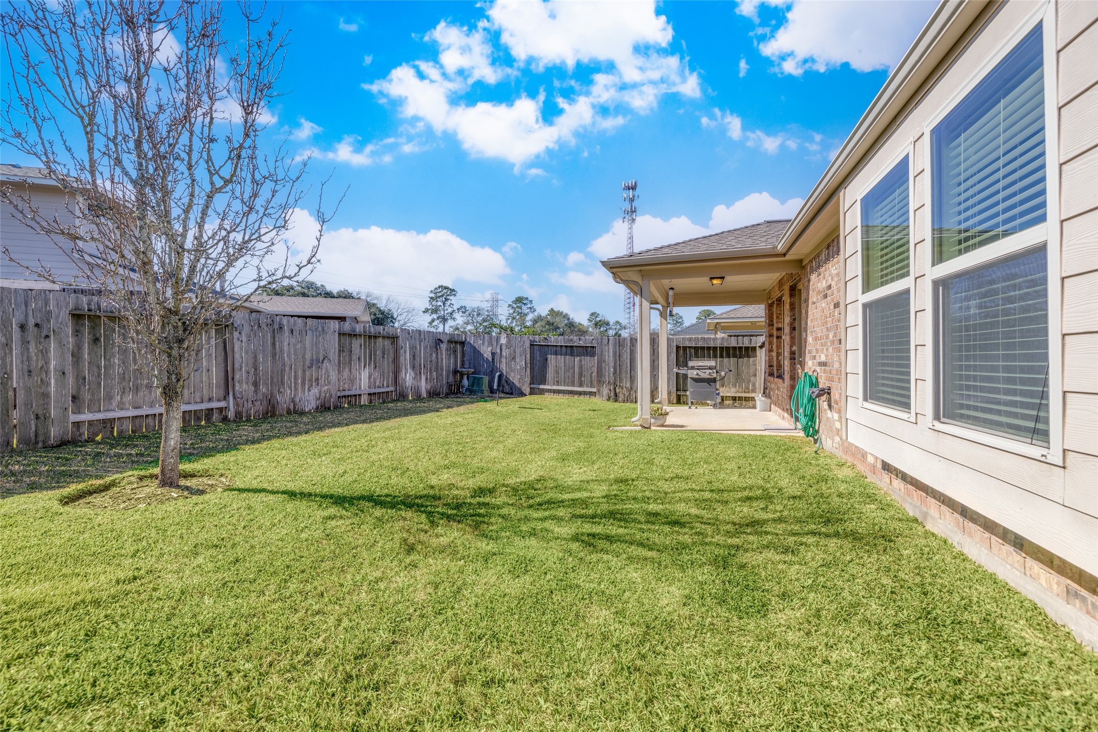 7123 Panther Ridge Drive Spring, TX 77389 - Photo 3 of 31 a view of a house with backyard and a tree