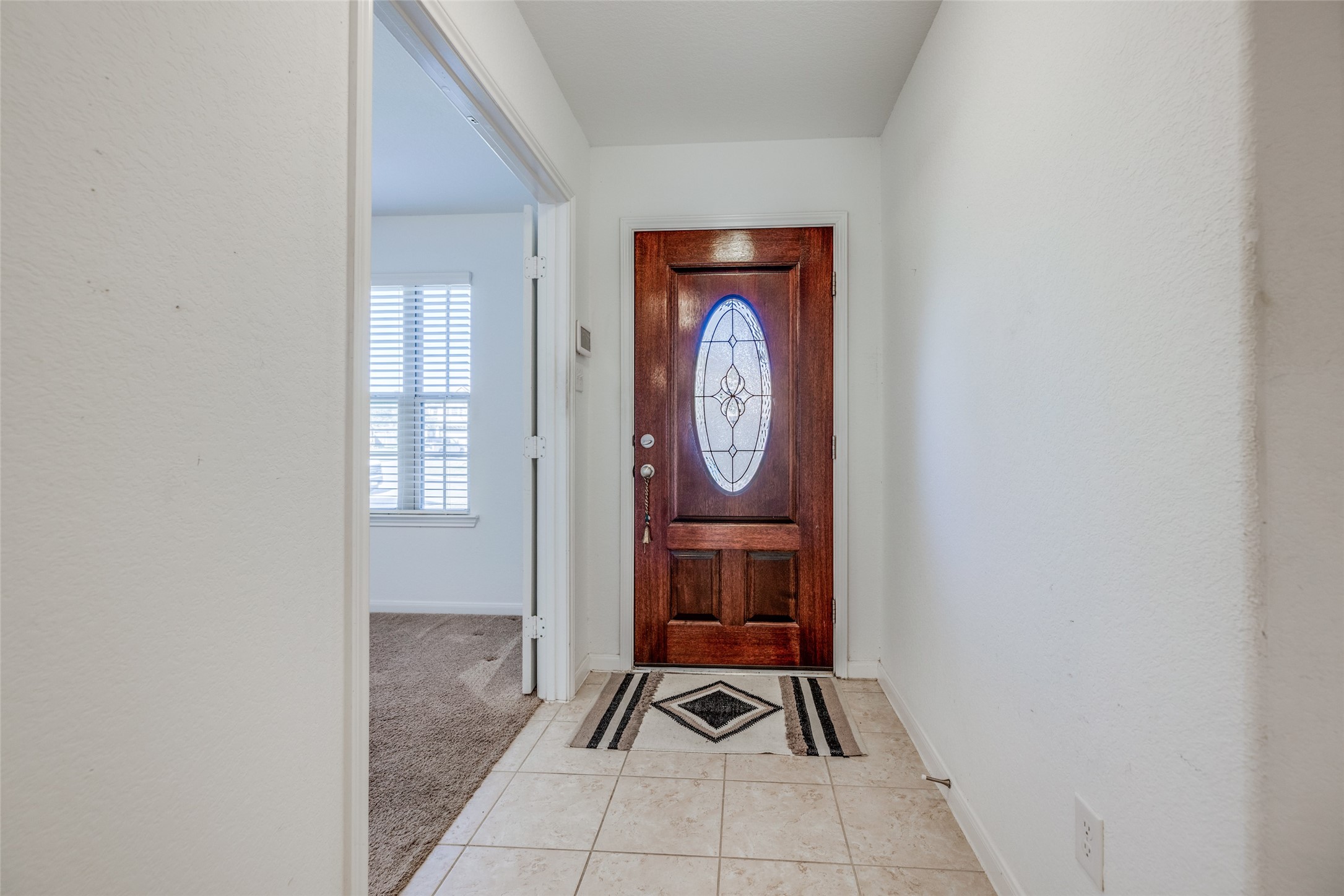 7123 Panther Ridge Drive Spring, TX 77389 - Photo 7 of 31 a room with painting and a table