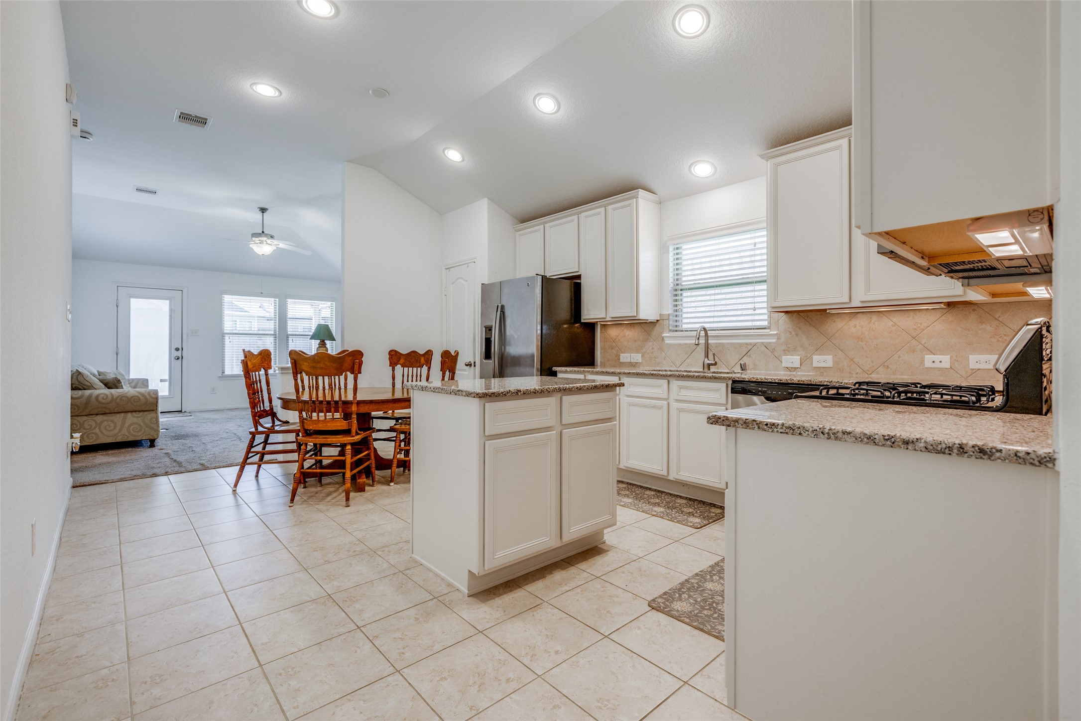 7123 Panther Ridge Drive Spring, TX 77389 - Photo 10 of 31 a kitchen with appliances cabinets and a counter top space