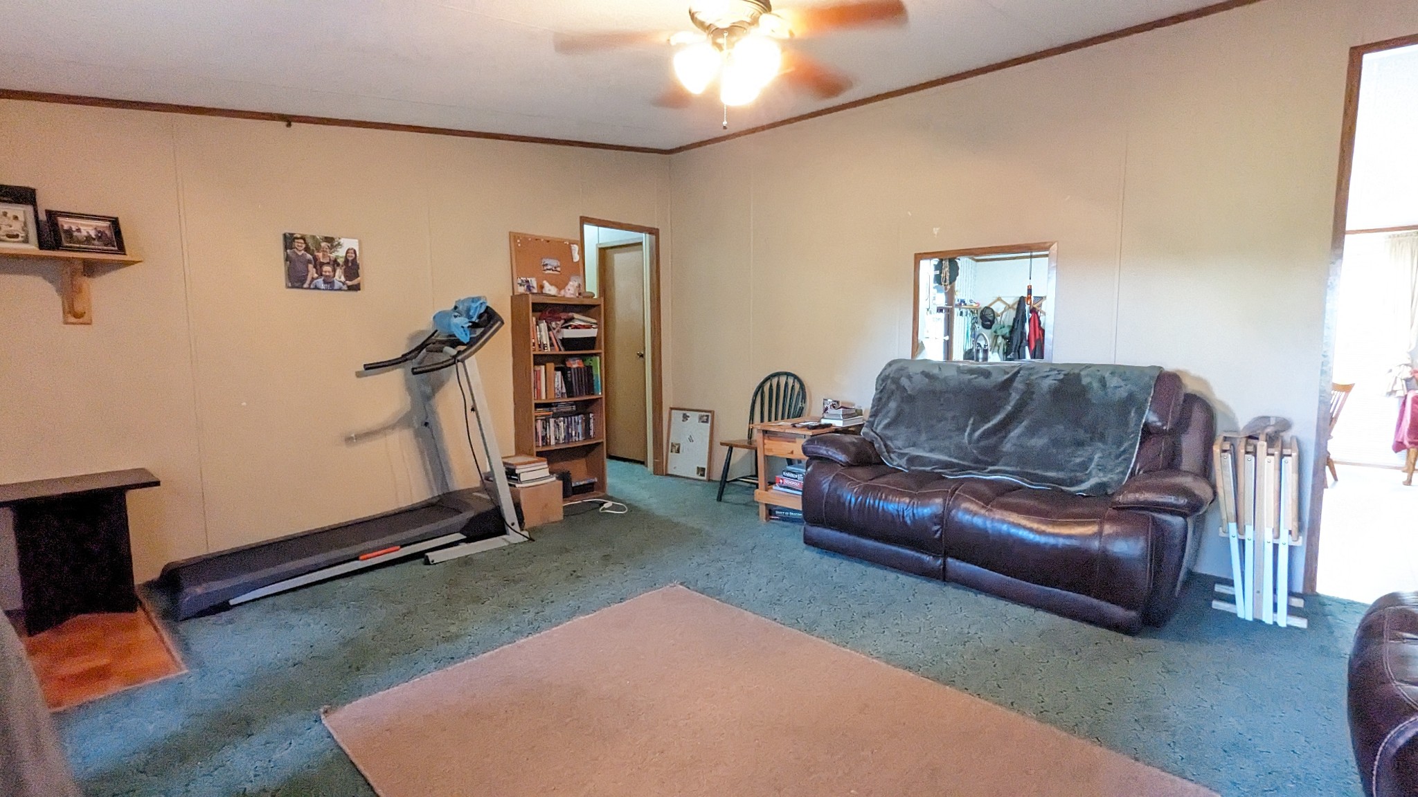 1473 North Sumner Road Bethpage, TN 37022 - Photo 7 of 40 a living room with furniture a couch and a flat screen tv