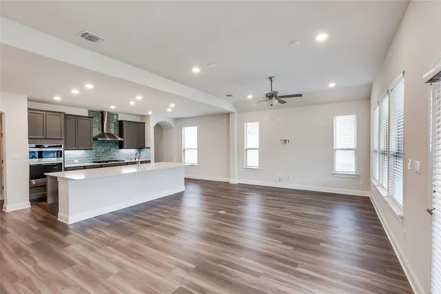 a view of kitchen with wooden floor