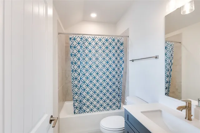 a view of a storage and utility room with a window