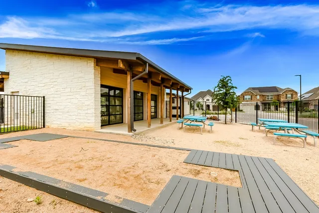 a front view of a house with swimming pool
