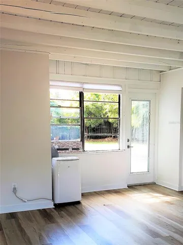 a view of a kitchen with a sink and dishwasher