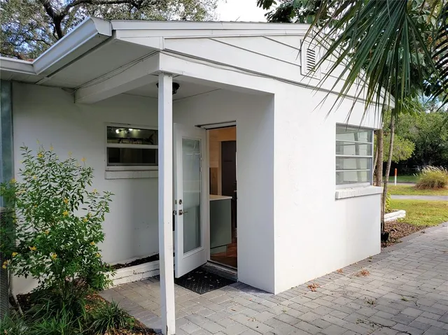 a view of a back yard of the house