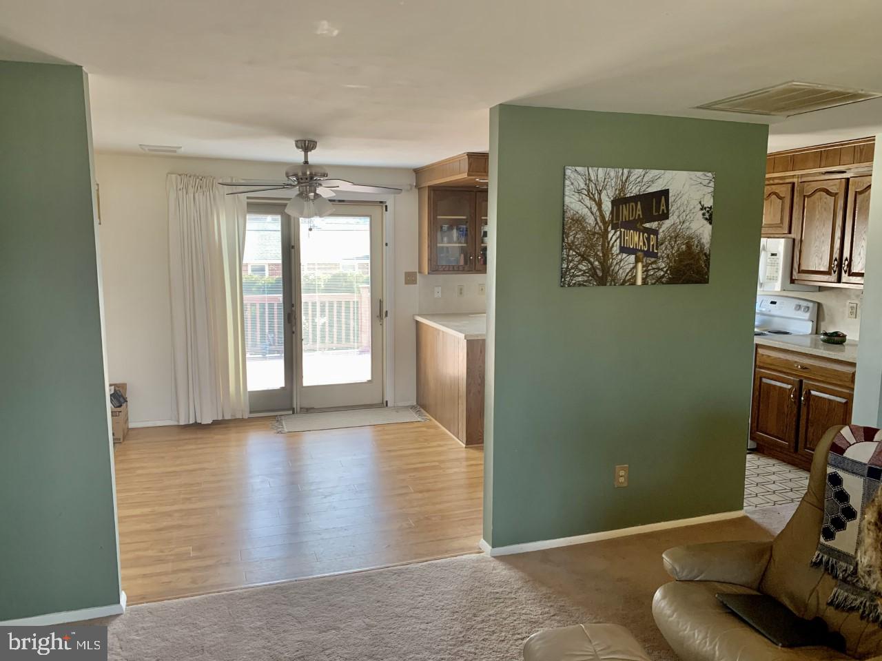 322 Egle Road Reading, PA 19601 - Photo 12 of 30 Living Room looking into Dining Rm / Deck.