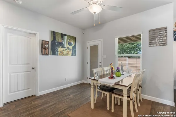 a workspace with furniture and wooden floor