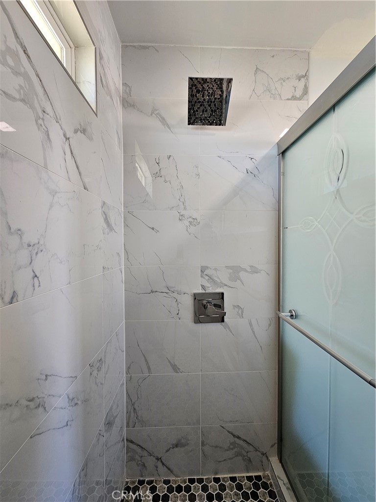 3939 Pinto Mountain Road Twentynine Palms, CA 92277 - Photo 22 of 47 a bathroom with a shower