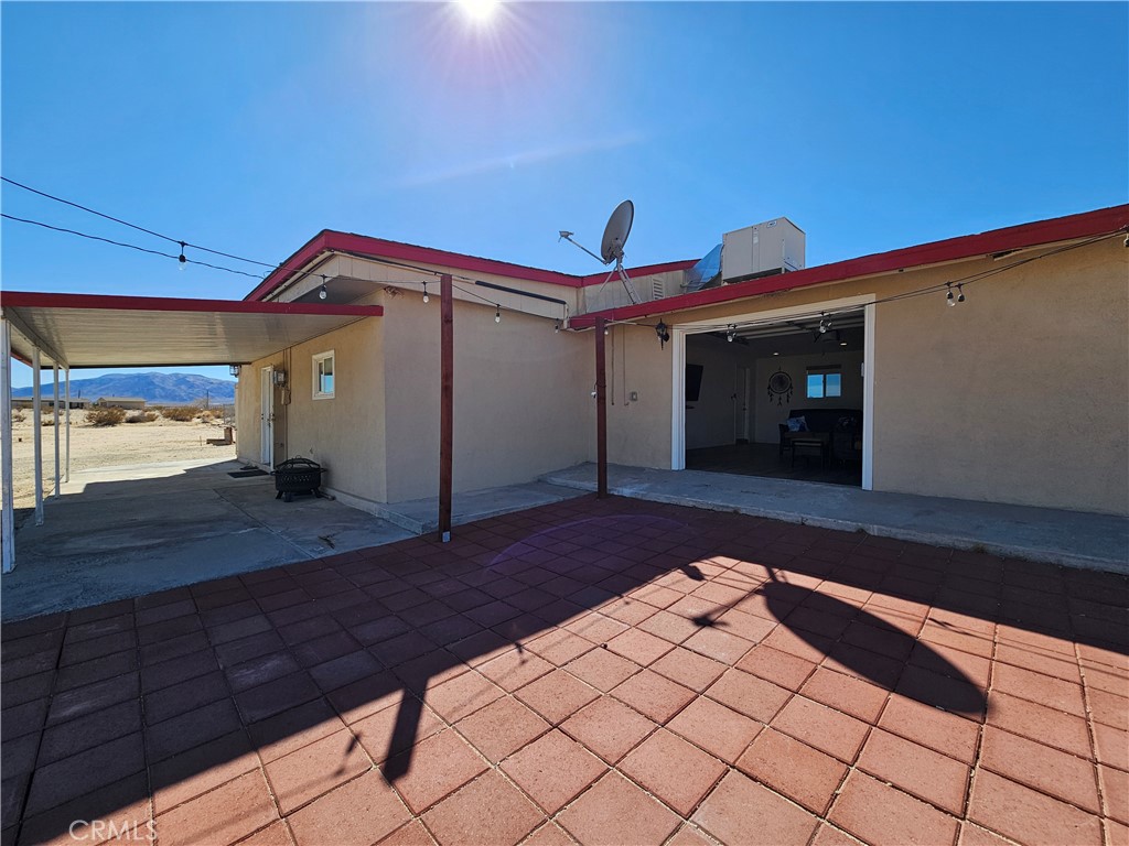 3939 Pinto Mountain Road Twentynine Palms, CA 92277 - Photo 26 of 47 a bedroom with a bed and a dresser
