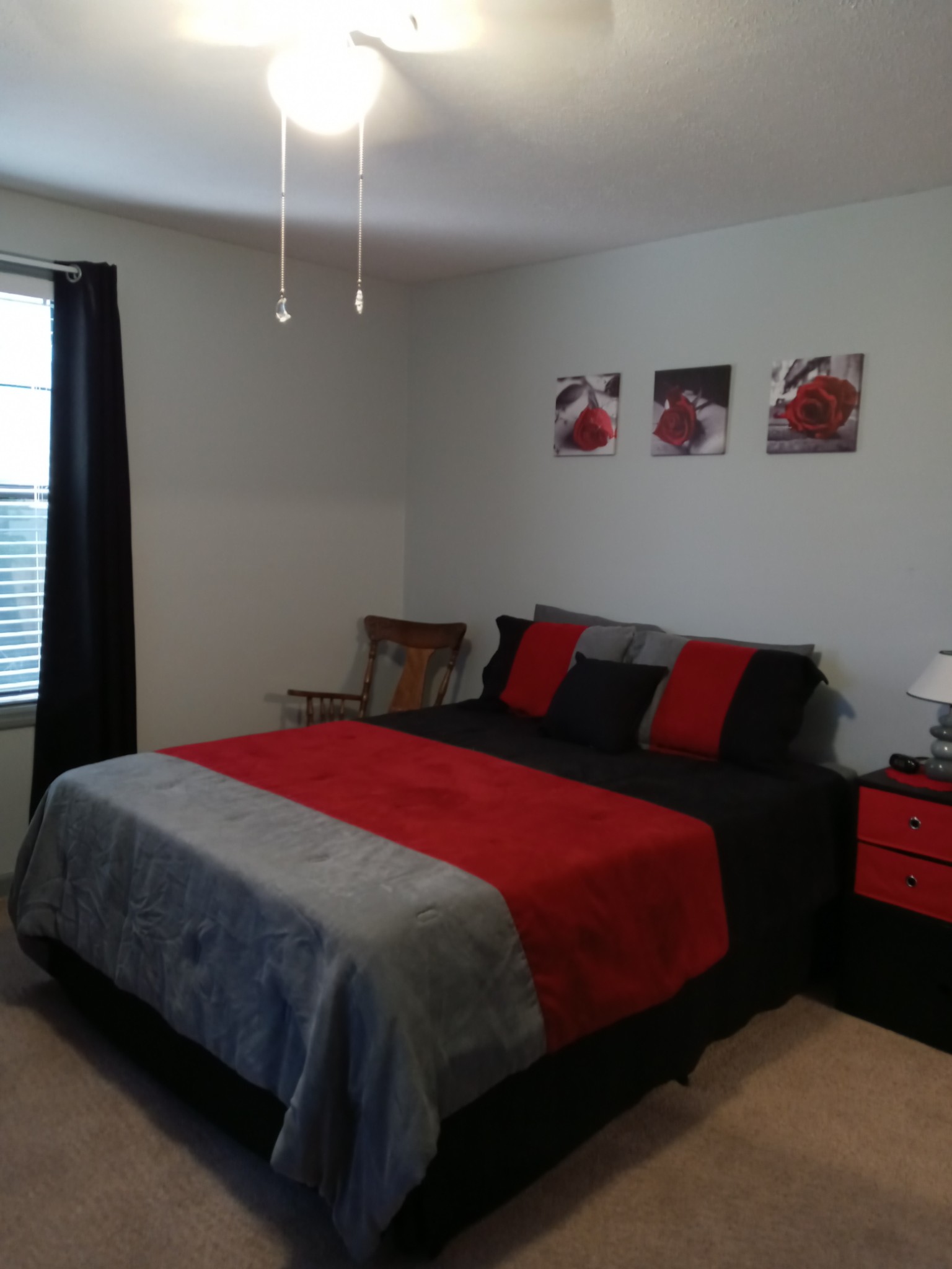 2628 Gideon Road Greenbrier, TN 37073 - Photo 23 of 40 a bedroom with a bed and a chandelier