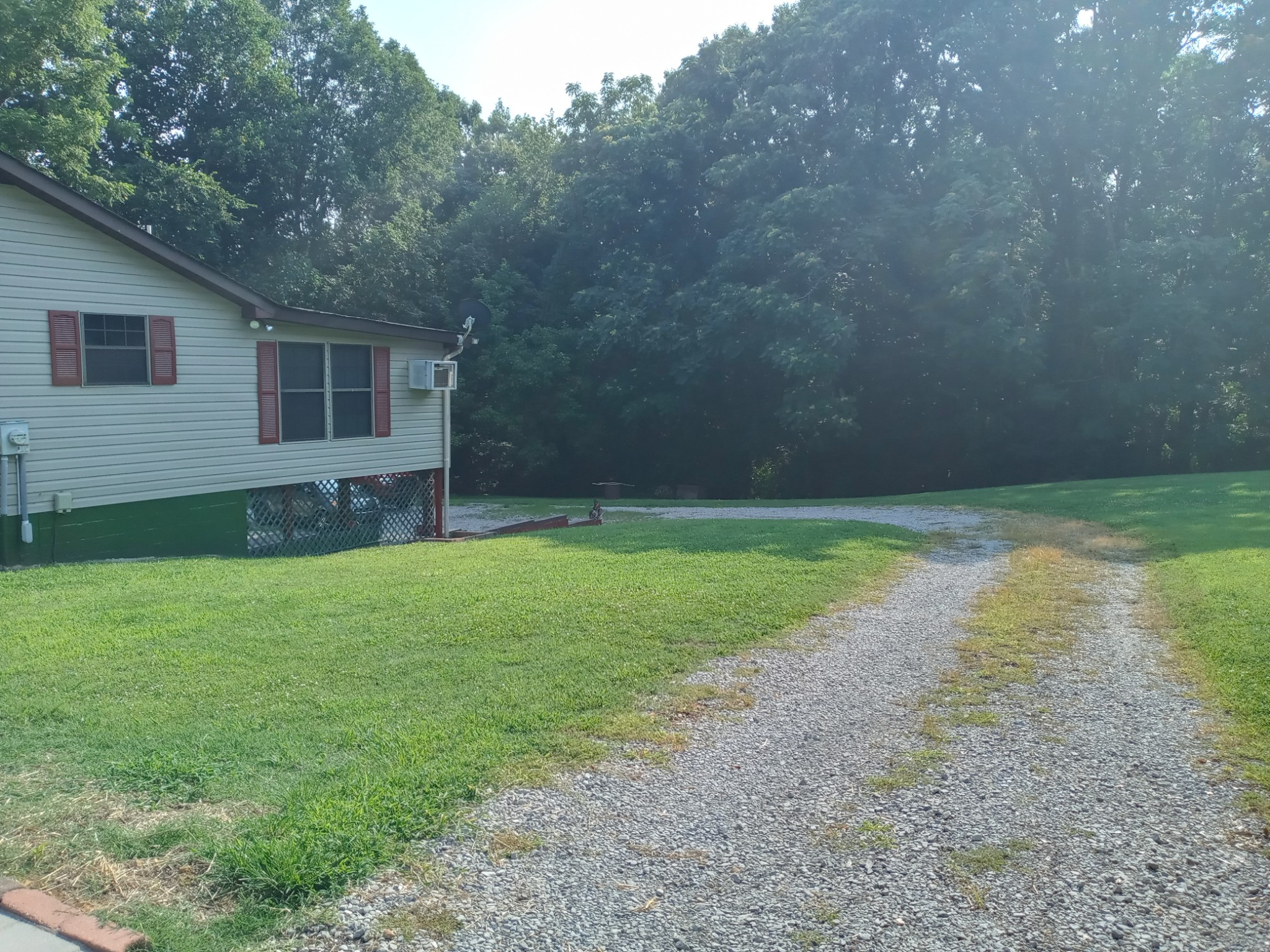 2628 Gideon Road Greenbrier, TN 37073 - Photo 6 of 40 a view of a backyard with a garden