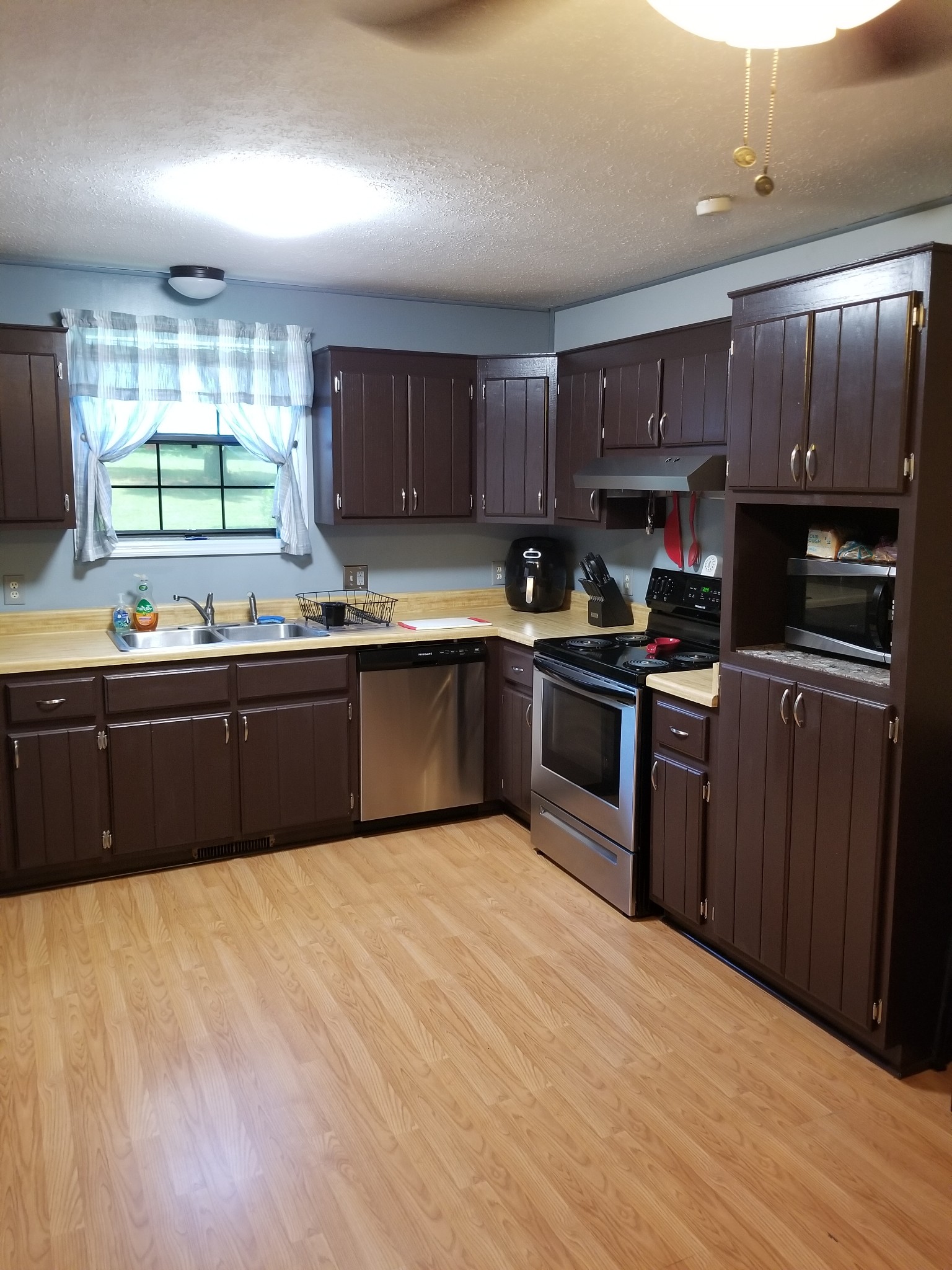 2628 Gideon Road Greenbrier, TN 37073 - Photo 9 of 40 a kitchen with stainless steel appliances granite countertop a sink counter space cabinets and a sink