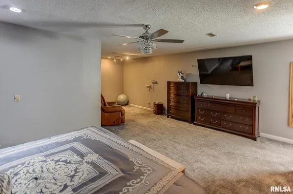 a bathroom with a sink vanity and mirror