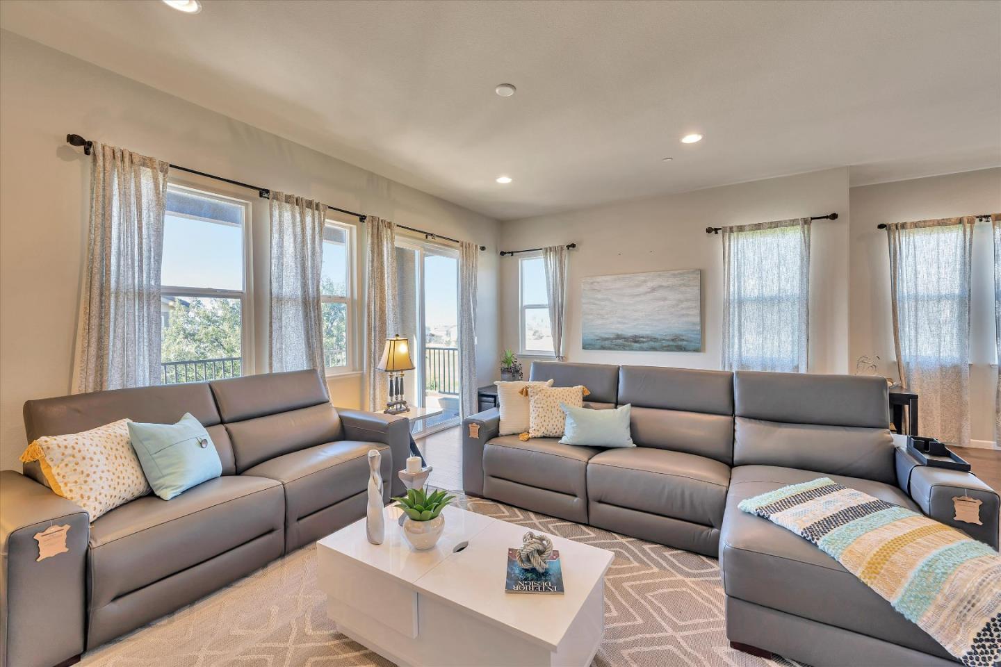 3001 Ruby Avenue San Jose, CA 95135 - Photo 11 of 58 a living room with furniture and a large window