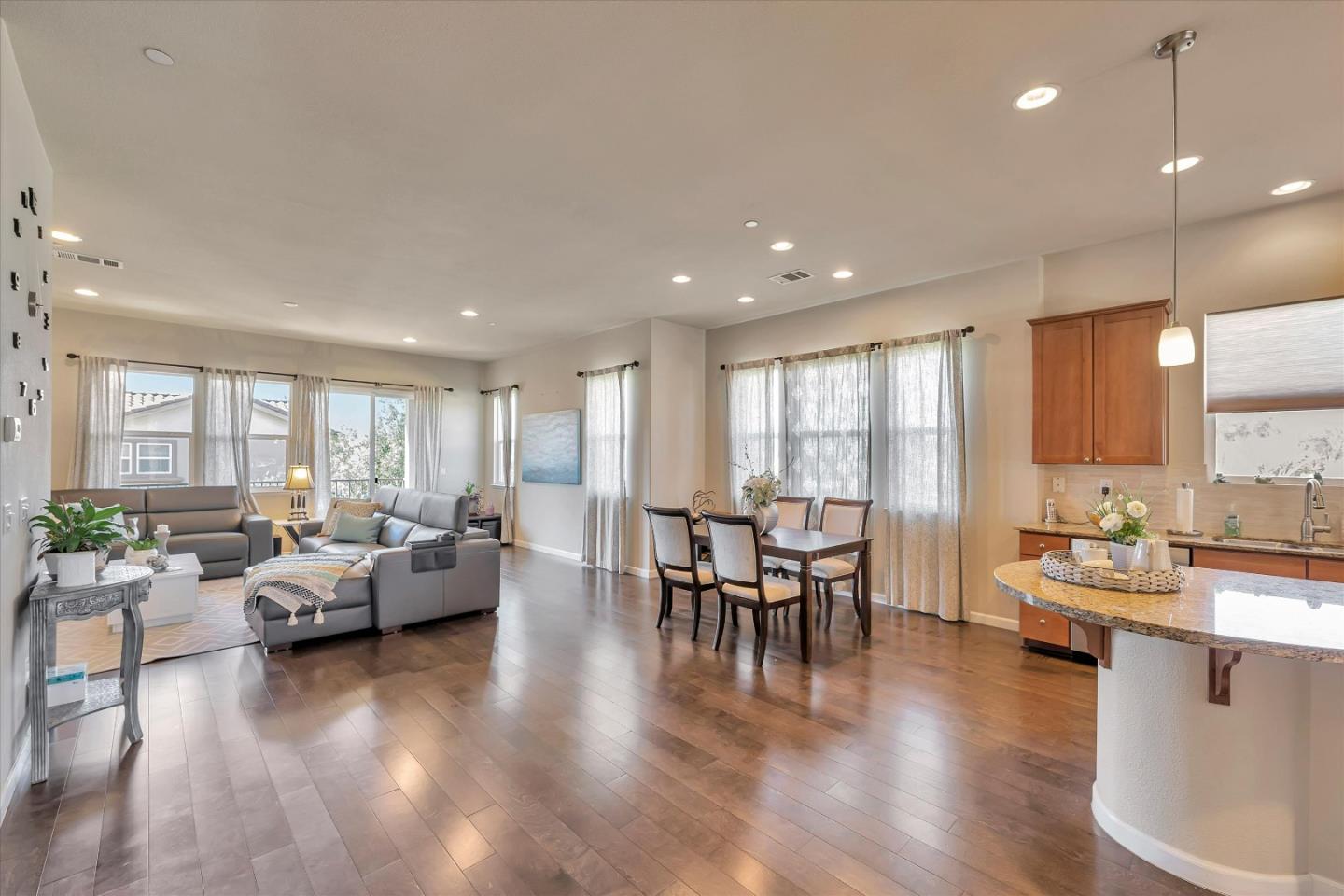 3001 Ruby Avenue San Jose, CA 95135 - Photo 12 of 58 a view of a dining room with furniture window and wooden floor