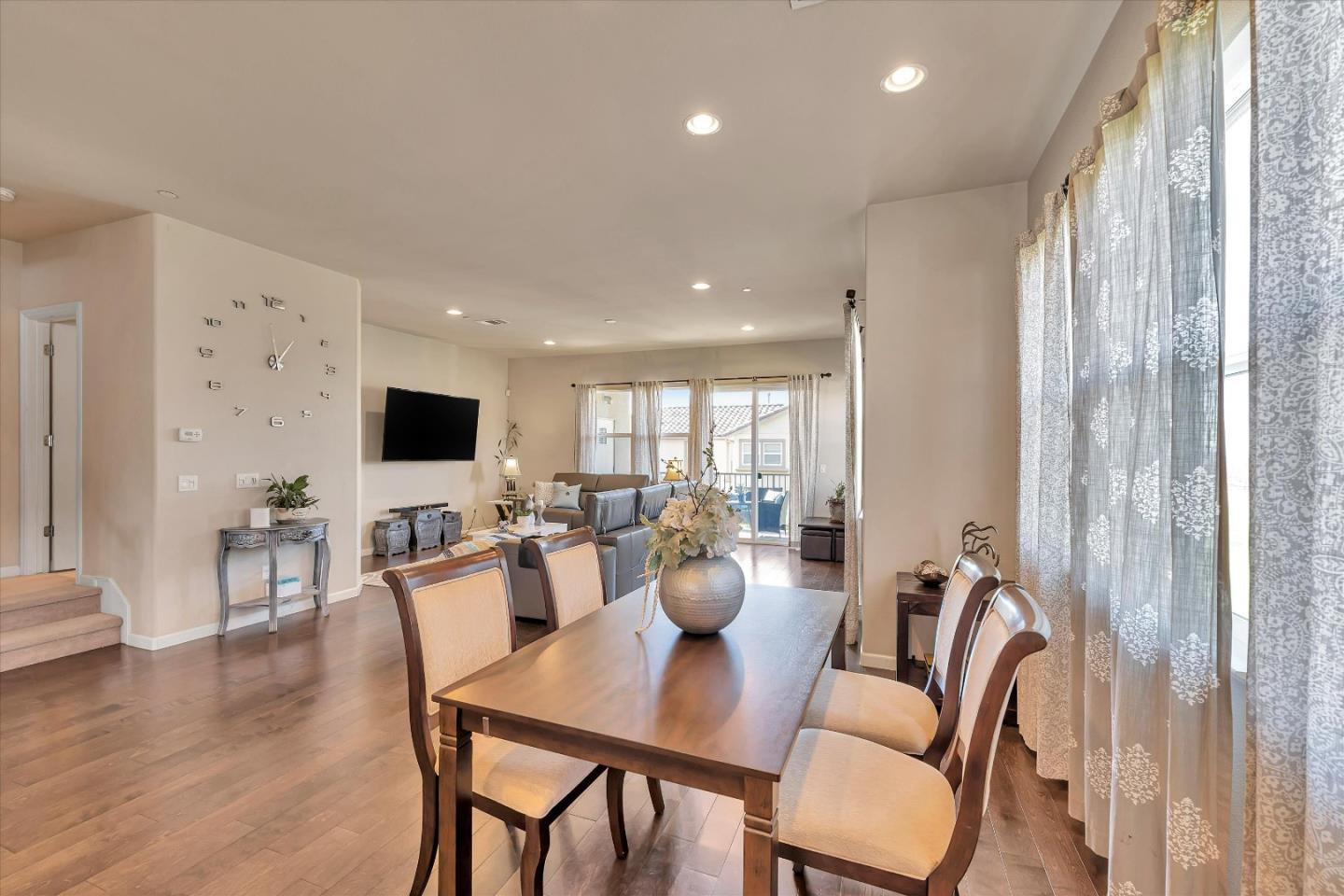 3001 Ruby Avenue San Jose, CA 95135 - Photo 20 of 58 a view of a dining room with furniture window and wooden floor