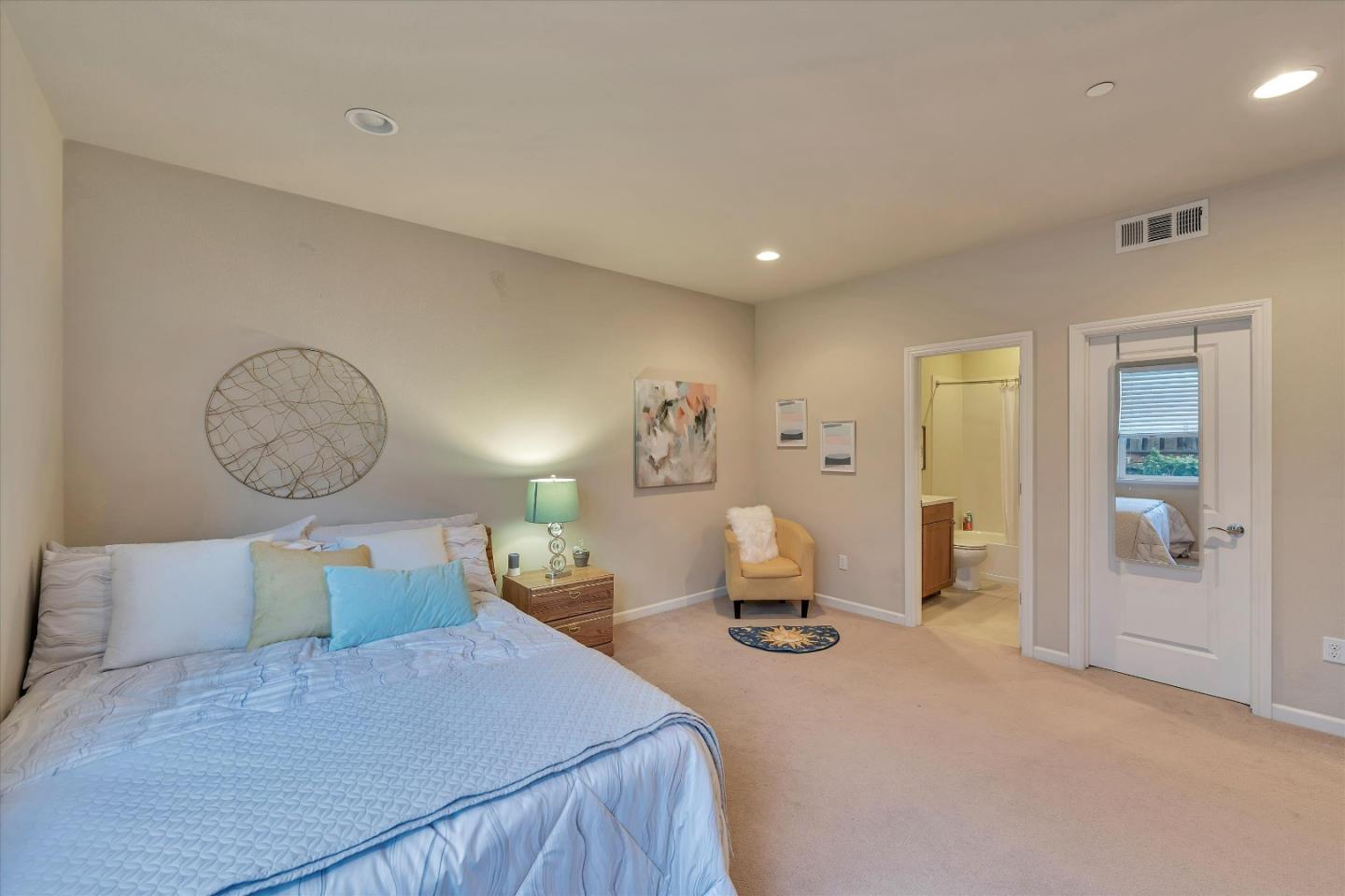3001 Ruby Avenue San Jose, CA 95135 - Photo 27 of 58 a bedroom with a bed and wooden floor