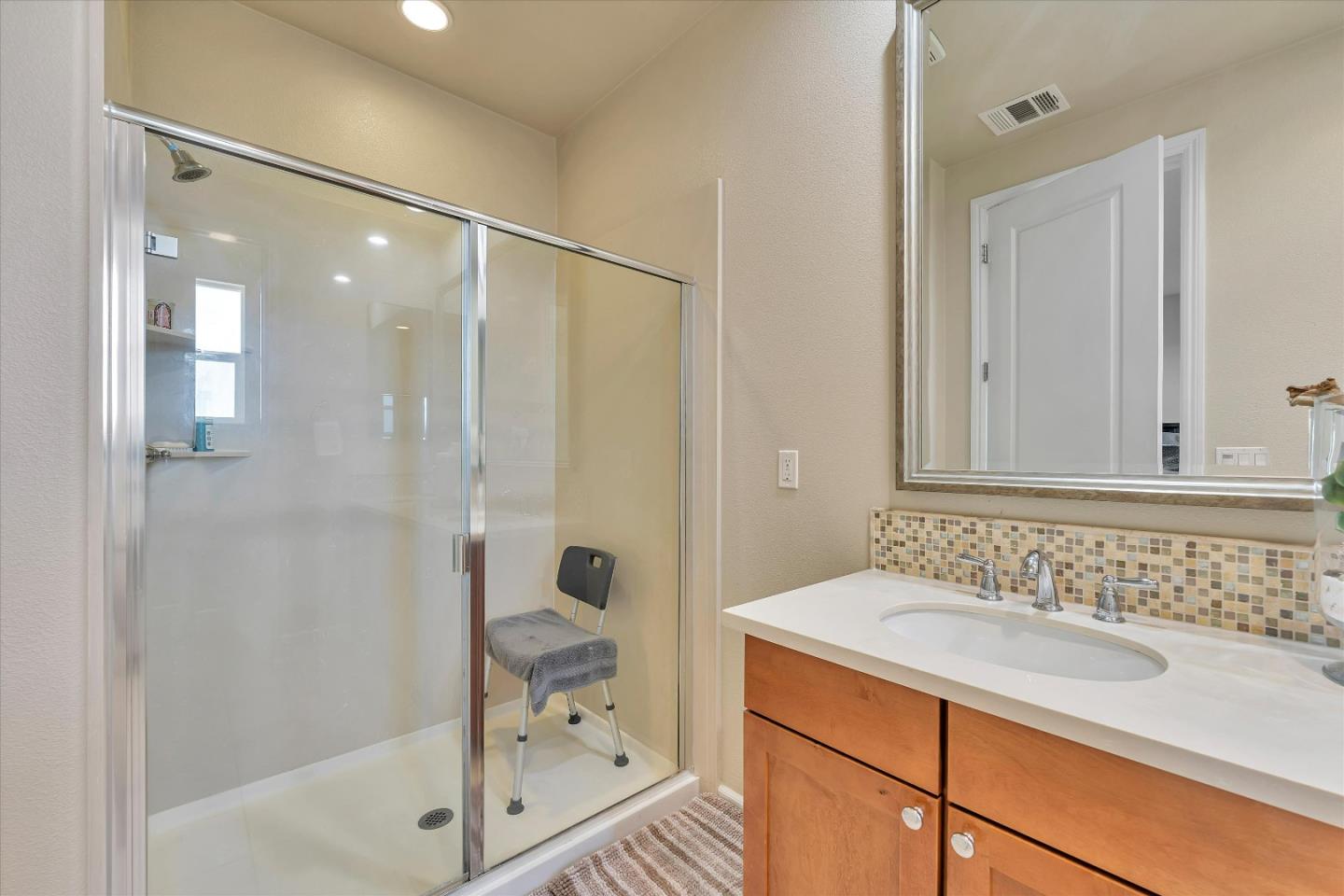 3001 Ruby Avenue San Jose, CA 95135 - Photo 39 of 58 a bathroom with a sink and a mirror