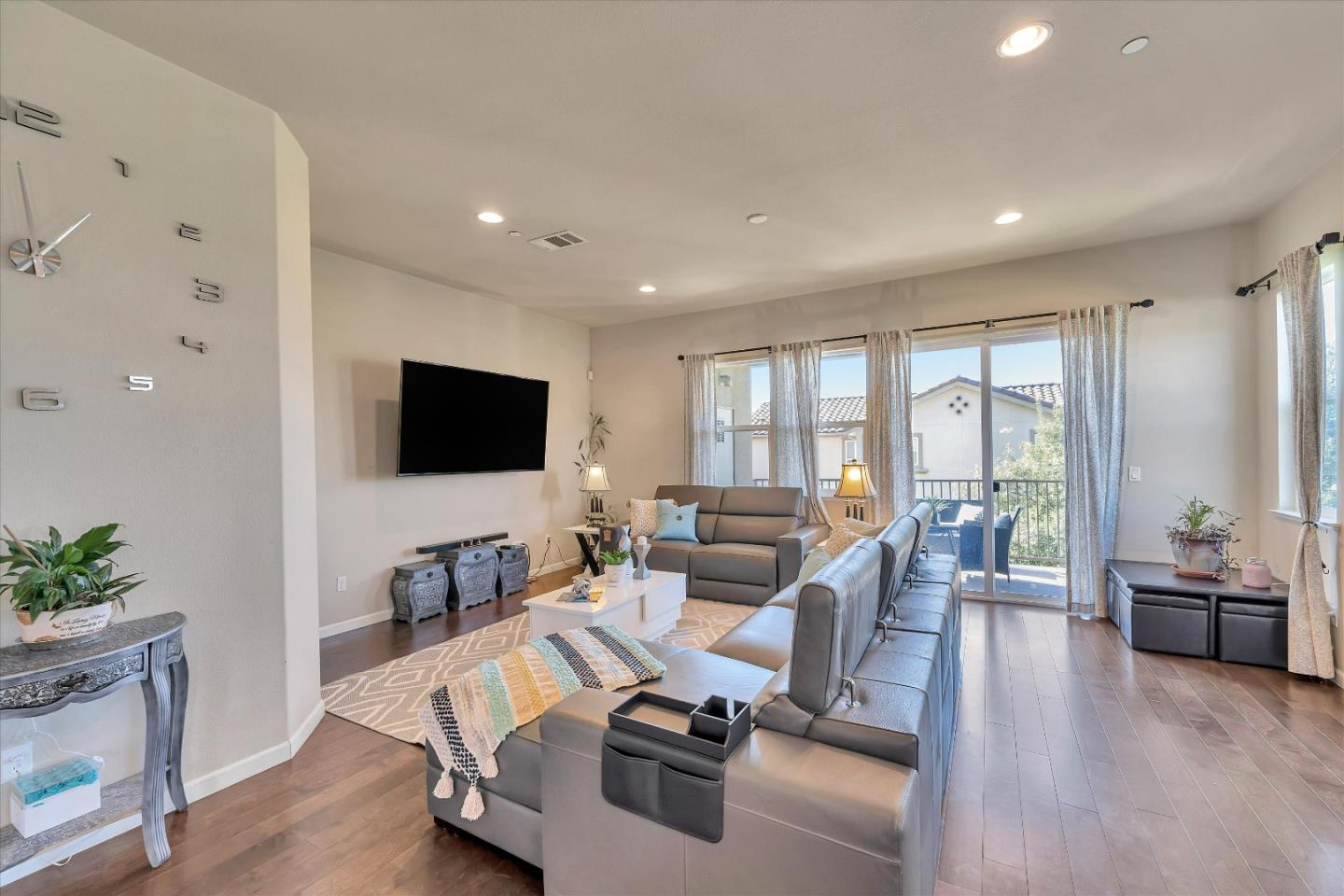 3001 Ruby Avenue San Jose, CA 95135 - Photo 6 of 58 a living room with furniture and a flat screen tv