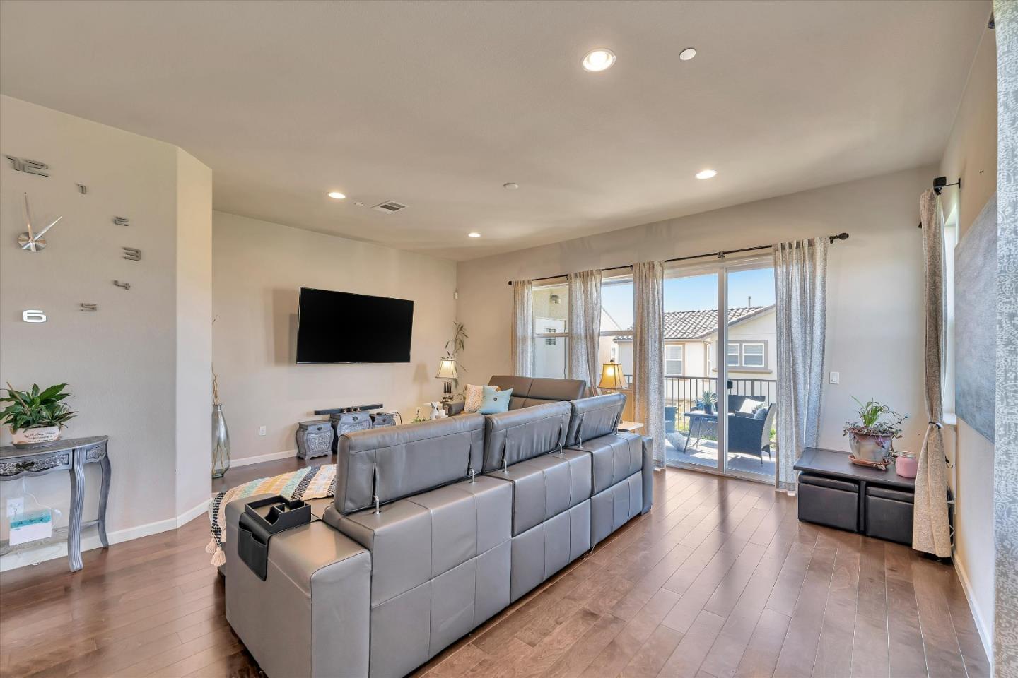 3001 Ruby Avenue San Jose, CA 95135 - Photo 7 of 58 a living room with furniture and a flat screen tv