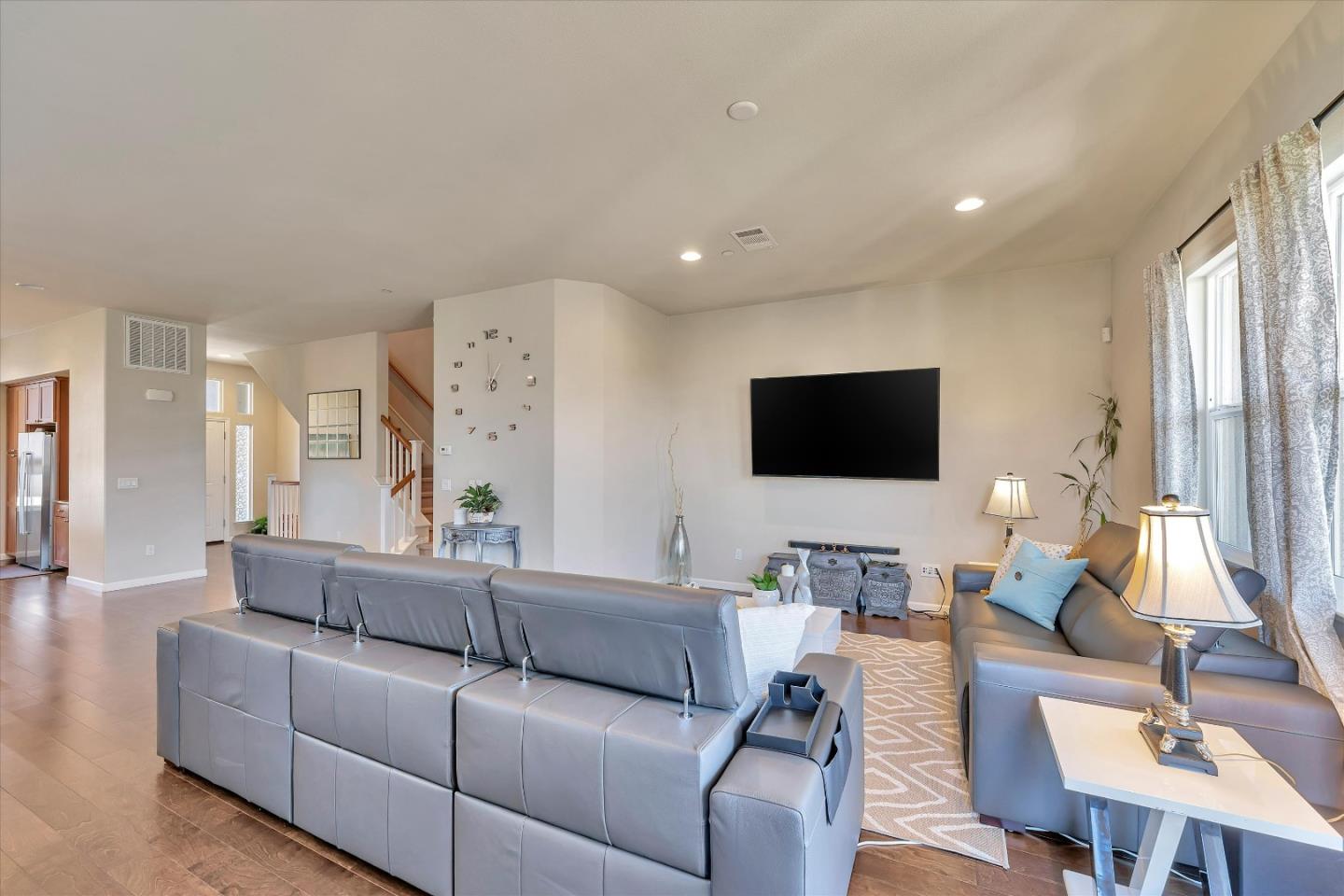 3001 Ruby Avenue San Jose, CA 95135 - Photo 8 of 58 a living room with furniture and a flat screen tv