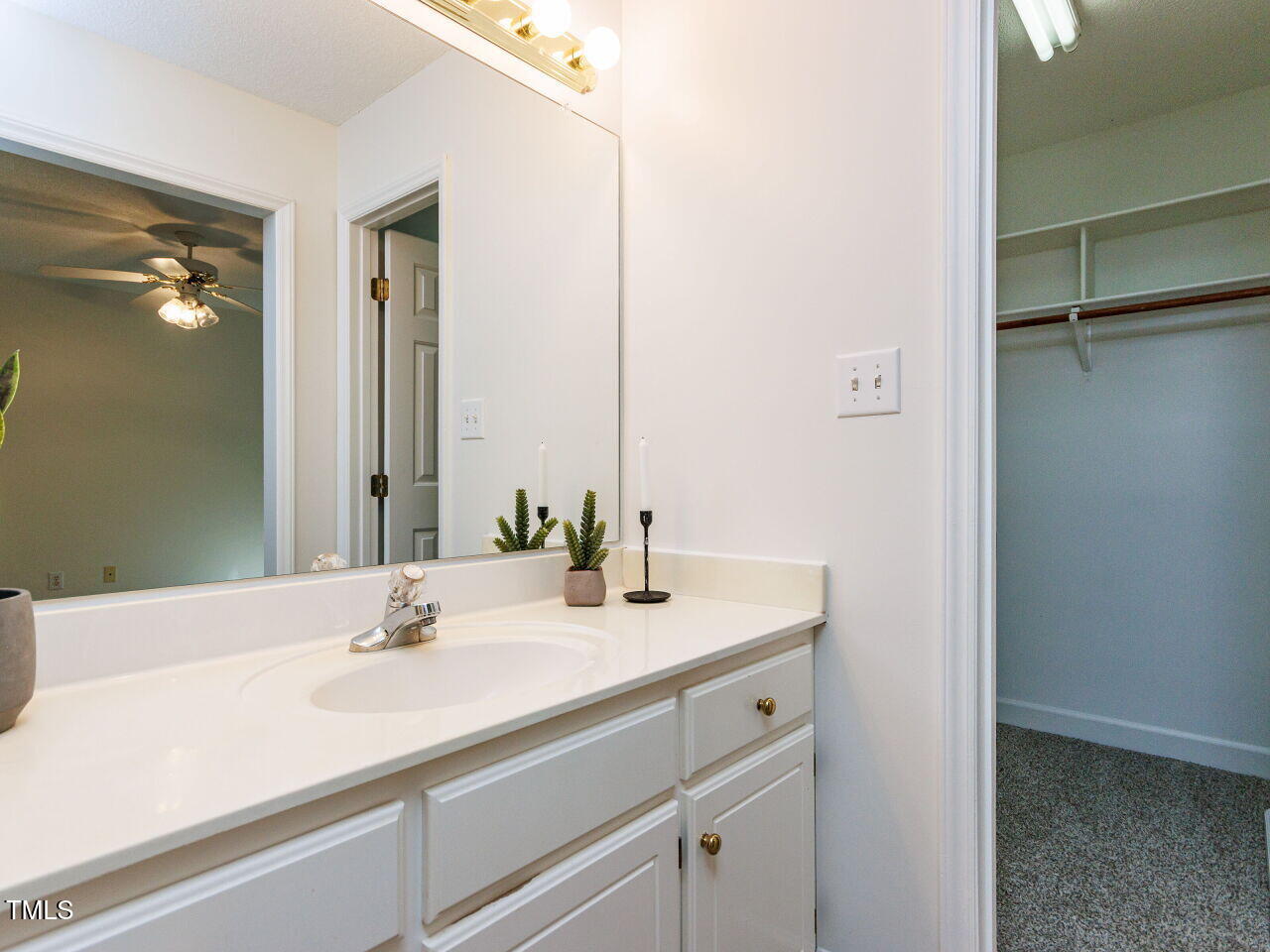 216 Deep Pool Court Benson, NC 27504 - Photo 18 of 37 a bathroom with a sink and a mirror