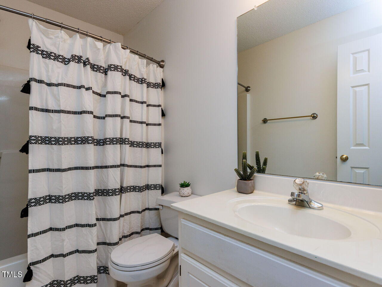 216 Deep Pool Court Benson, NC 27504 - Photo 23 of 37 a bathroom with a sink toilet and shower