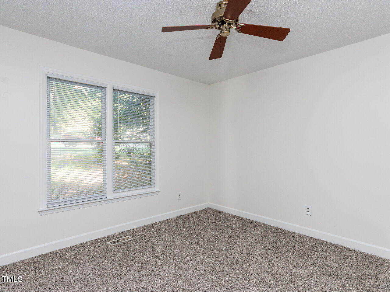 216 Deep Pool Court Benson, NC 27504 - Photo 25 of 37 an empty room with a window