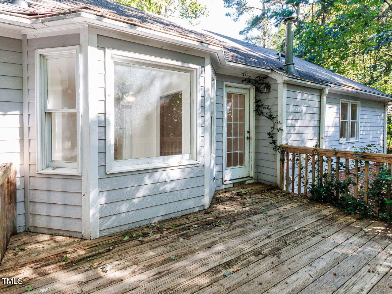216 Deep Pool Court Benson, NC 27504 - Photo 28 of 37 a view of house with wooden fence