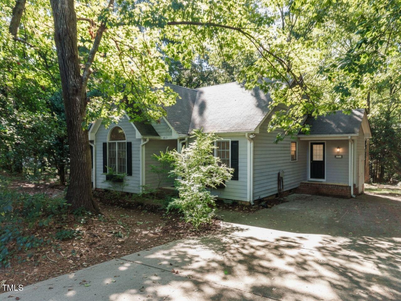 216 Deep Pool Court Benson, NC 27504 - Photo 2 of 37 a front view of a house with garden
