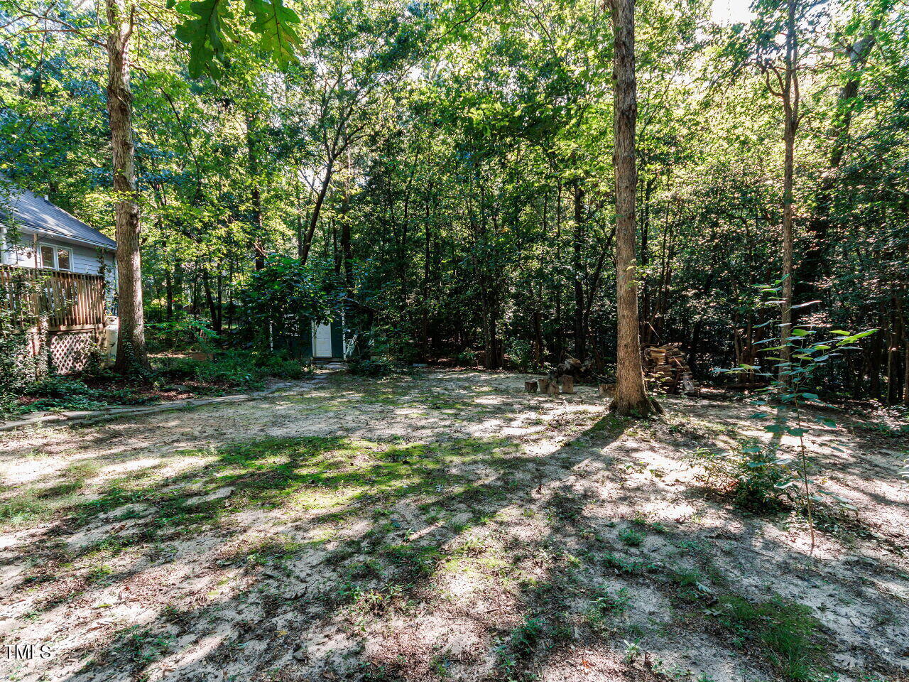216 Deep Pool Court Benson, NC 27504 - Photo 33 of 37 a backyard of a house with lots of green space